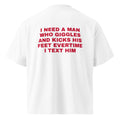 I NEED A MAN WHO GIGGLES AND KICKS HIS FEET EVERTIME I TEXT HIM oversized t-shirt – white back view | So True